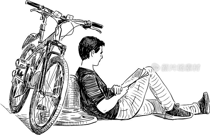 一个骑自行车的人在城堤上休息
