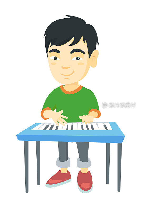 一个亚洲小男孩在弹钢琴