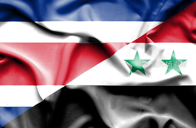 挥舞着叙利亚和哥斯达黎加的旗帜