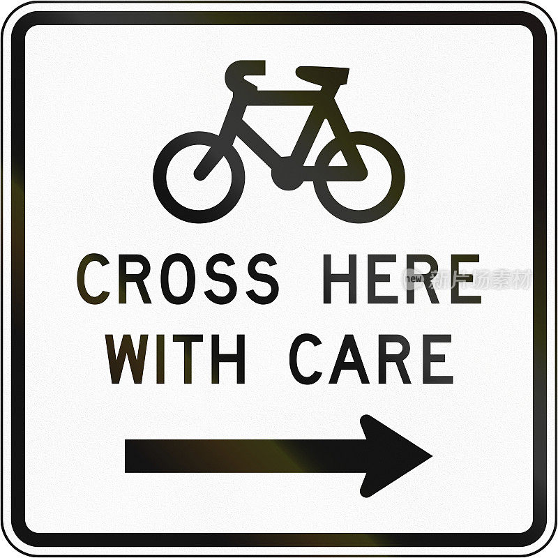 新西兰道路标志-建议骑自行车的人小心过马路的标志
