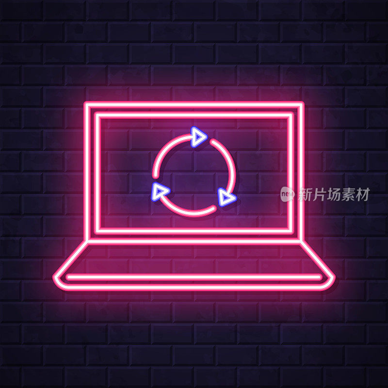 在笔记本电脑上刷新或重新加载。在砖墙背景上发光的霓虹灯图标