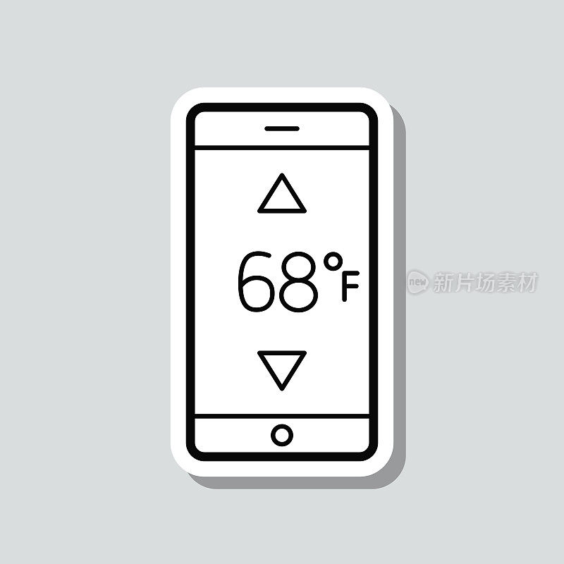 带加热控制的智能手机。图标贴纸在灰色背景