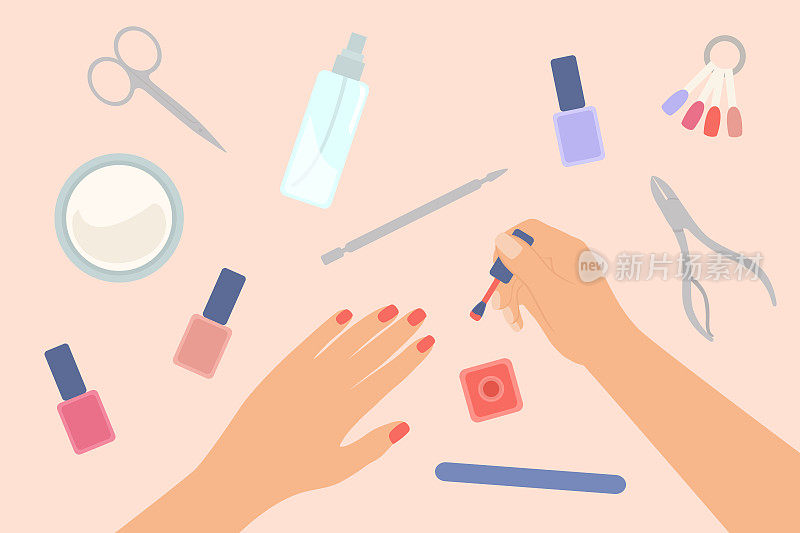 指甲护理概念。修剪女性的手和在指甲上涂指甲油。桌上的美甲设备