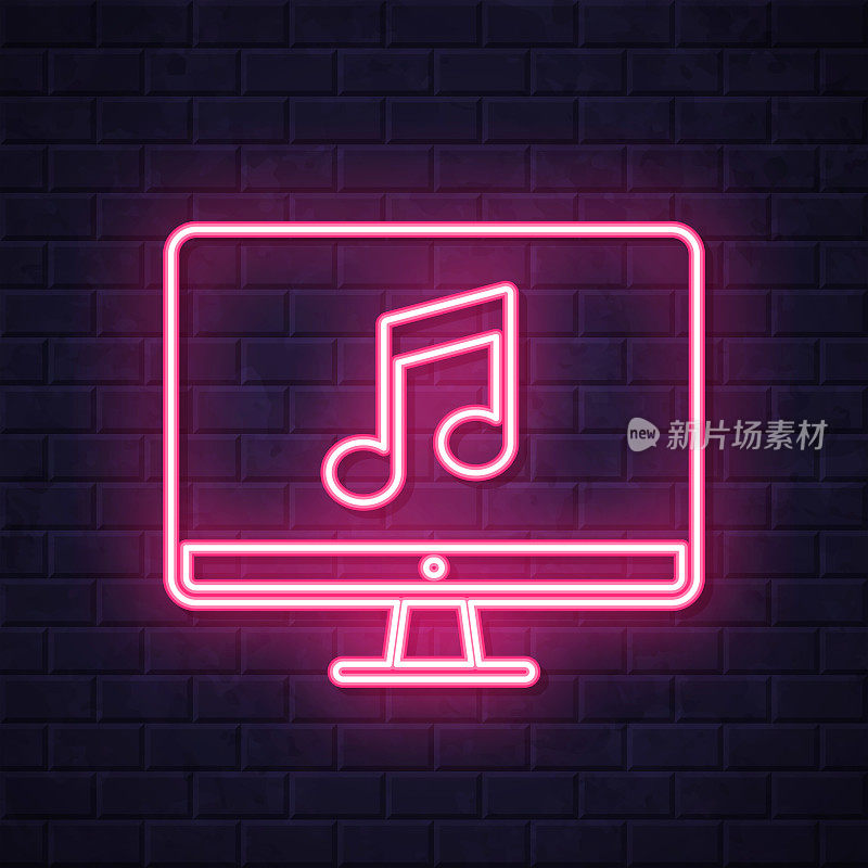 台式电脑上的音乐。在砖墙背景上发光的霓虹灯图标