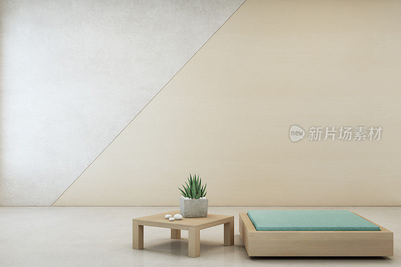 木质茶几上的室内植物和以空混凝土墙为背景的简约家具，是现代住宅客厅中的休息室