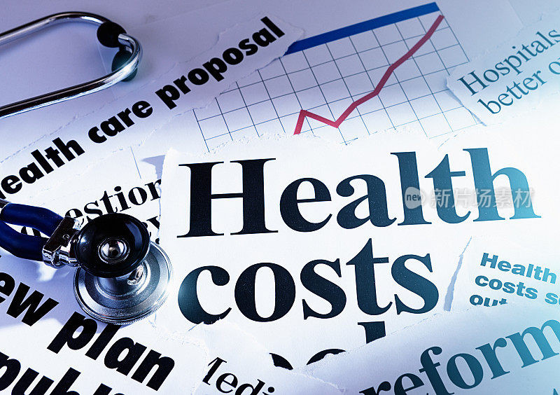 健康成本印刷头条与医疗听诊器