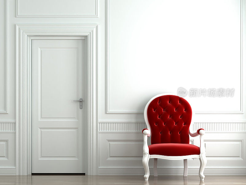 白色墙壁上的红色天鹅绒扶手椅