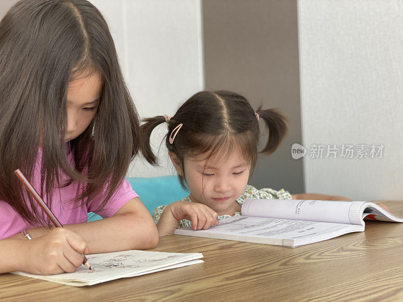 视力危机，亚洲女孩读书和学习