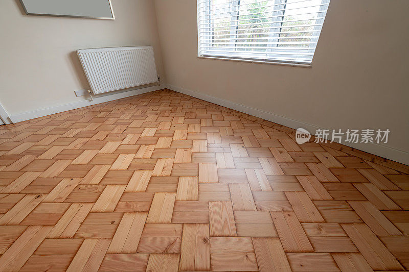空房间的拼花地板，专注于地板