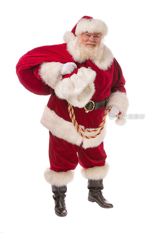 真正的圣诞老人与袋子在白色上摆姿势