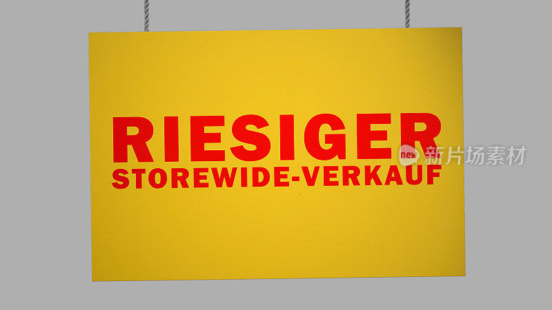 挂在绳子上的德国硬纸板招牌。包括剪切路径，以便您可以放置自己的背景。