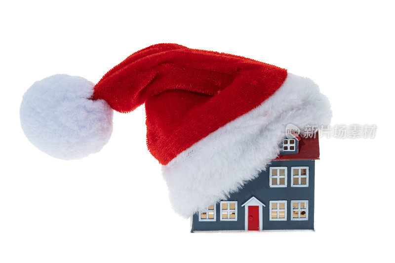 房子和圣诞派对的帽子——白色背景