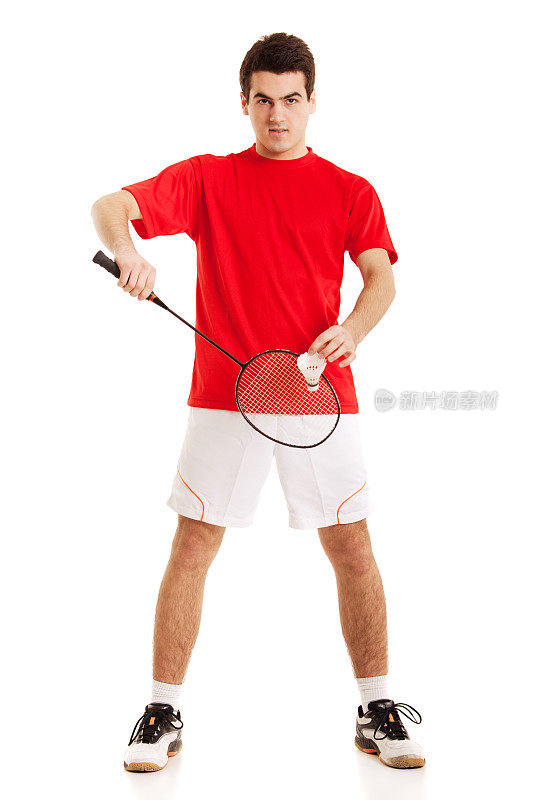 羽毛球运动员准备用球拍击球