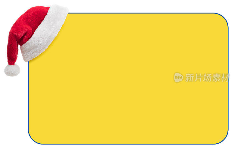 圣诞老人帽在黄色空白的公告牌上，有复制空间(孤立在白色)