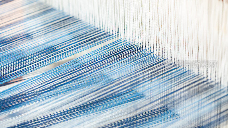 特写，抽象运动模糊的丝绸织物编织
