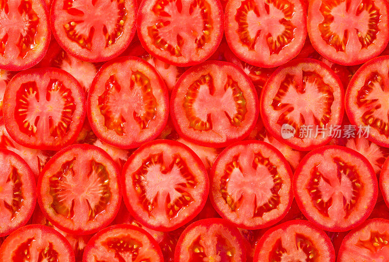 番茄片排列成行，红色番茄组成满框