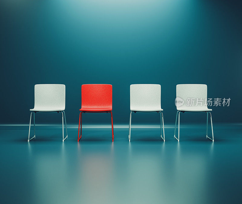 《选择脱颖而出:白人中独一无二的红椅子