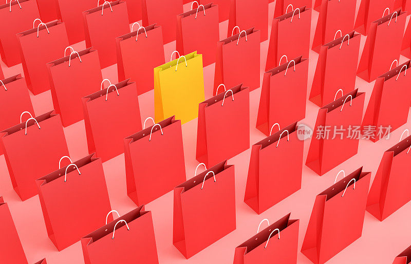 黄色购物袋从红色购物袋中脱颖而出。
