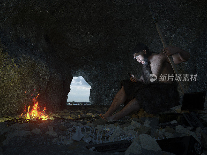 原始人坐在山洞里与智能手机的概念插图
