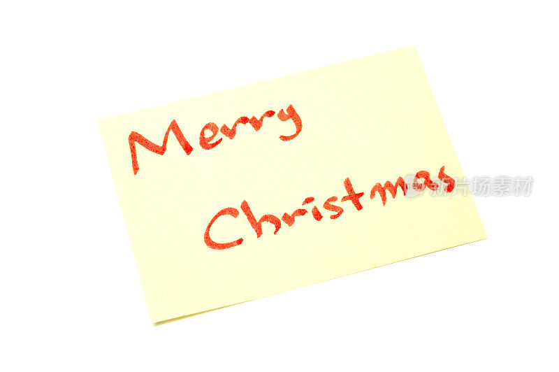 黄色的纸上写着圣诞快乐，白色的背景