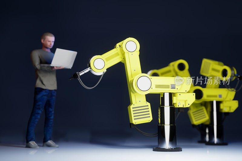 黄色机器人和工程师与笔记本电脑