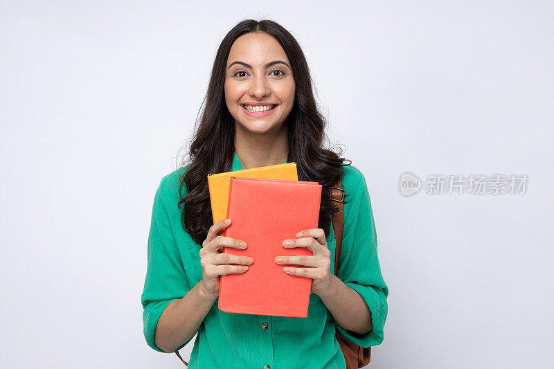 女大学生的肖像在白色背景股票照片