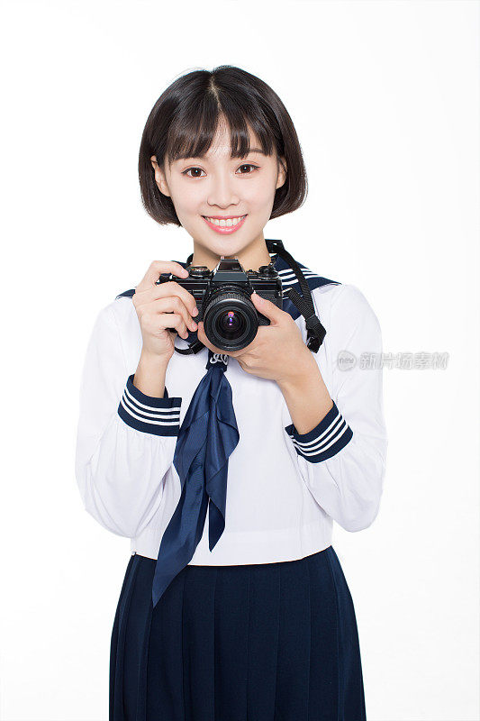 中国女孩拿着单反相机