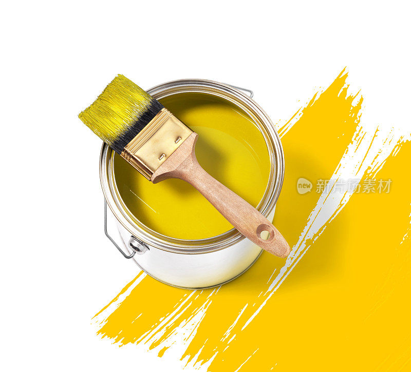 黄色的油漆罐，上面有刷子