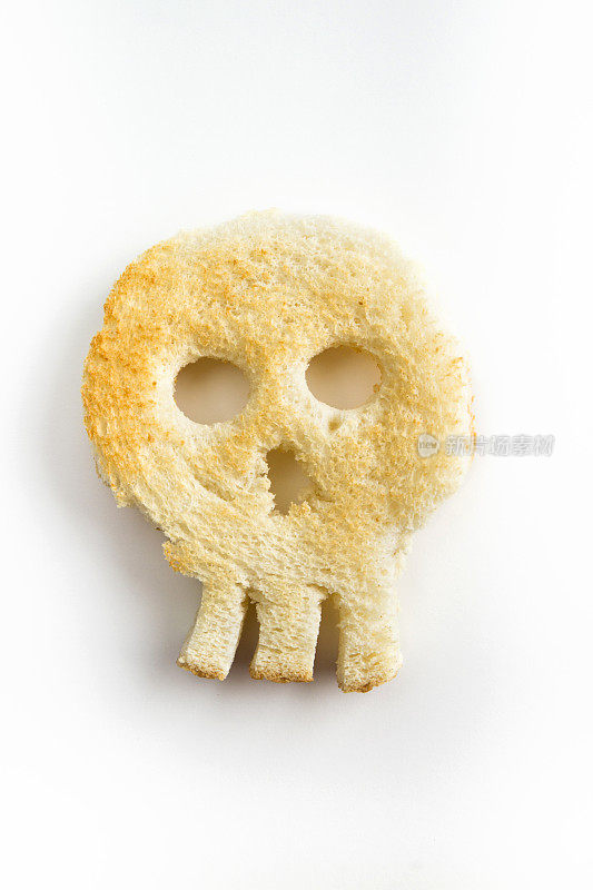 烤面包形状像头骨-不健康的麸质概念