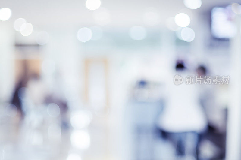 病人在医院等待医生的模糊背景，抽象的背景。