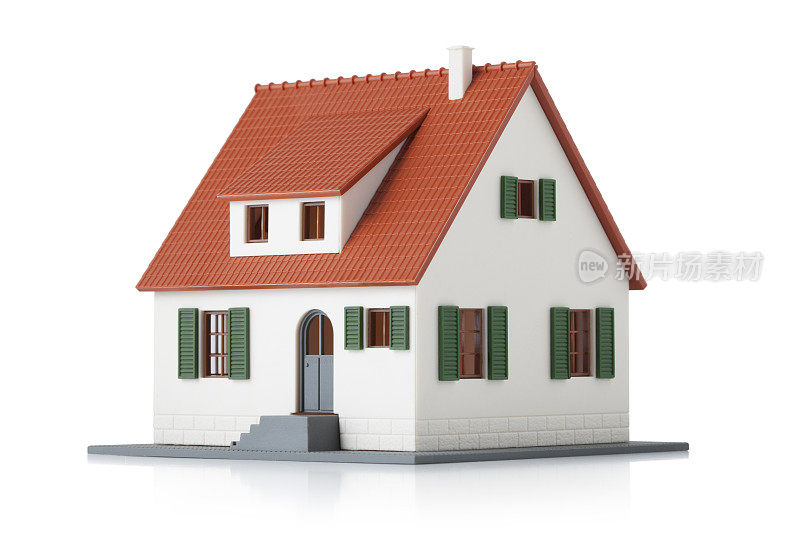 白色背景上的微型房屋模型