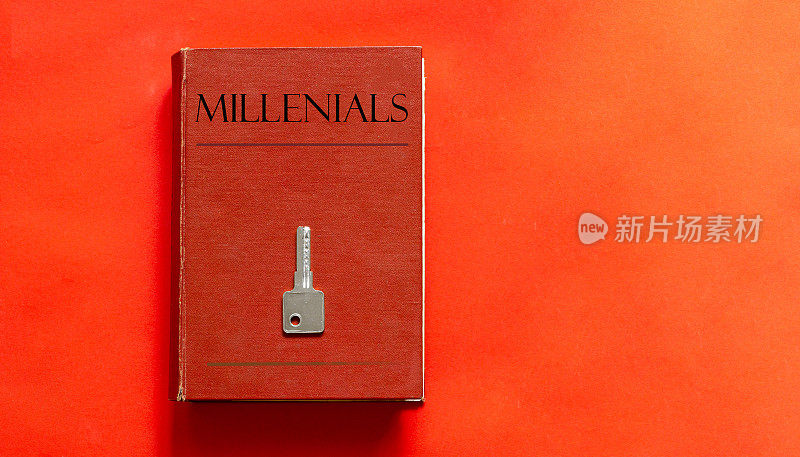 红色的书与文本MillenialsÂ和一个键在一个红色的背景