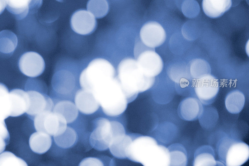 抽象的蓝色散景，圣诞和新年主题背景