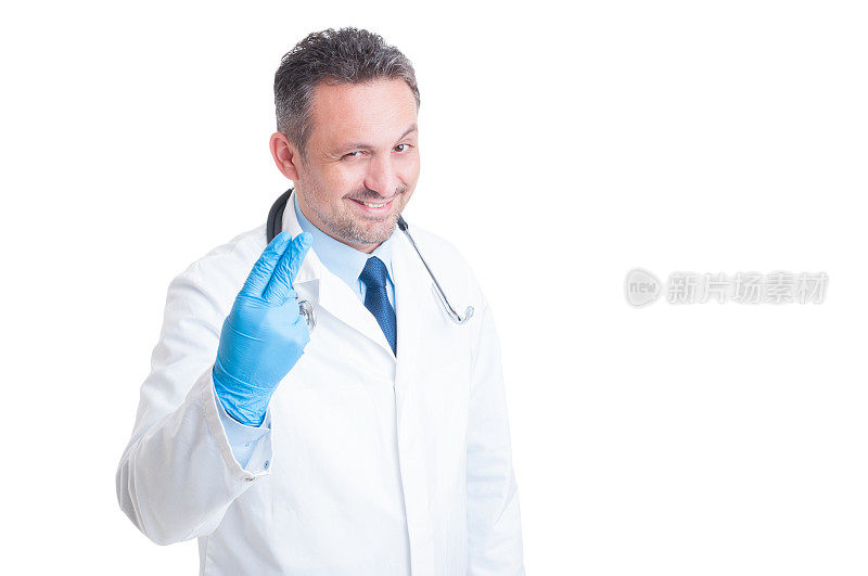 直肠科医生戴着医用乳胶手套露出两根手指