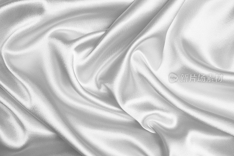 白色丝绸波浪纹理背景