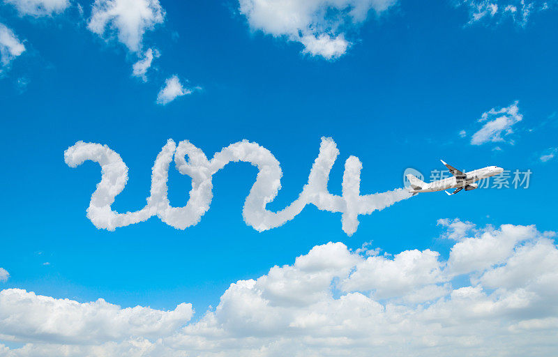 天空中写着新年数字2024的飞机