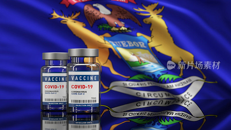美国密歇根州旗和Covid-19冠状病毒疫苗概念瓶小瓶。景深。