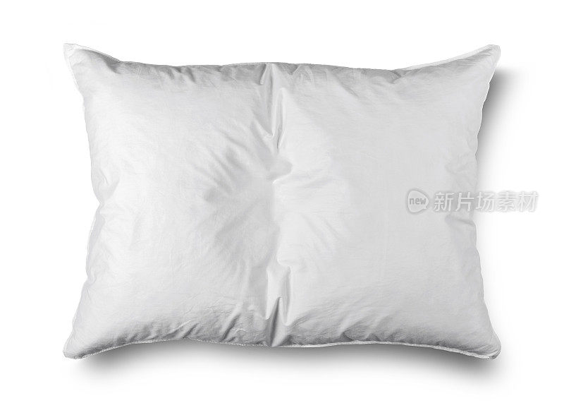 白色背景上的一个白色枕头的特写