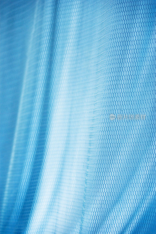 蓝色丝质光滑网状织物抽象背景