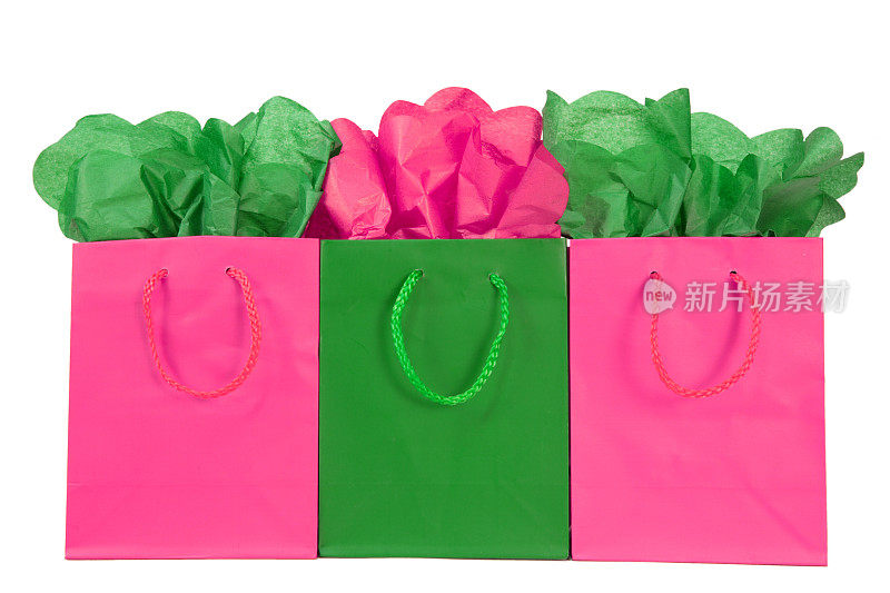 庆典:红、绿、粉的礼品袋和纸三合一