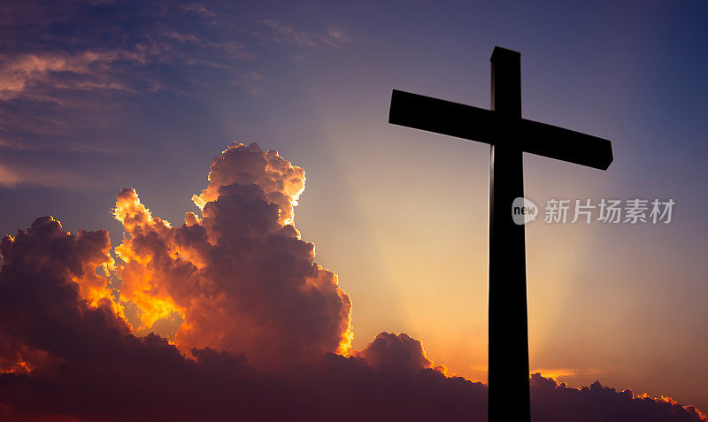基督教跨越美丽的日落背景