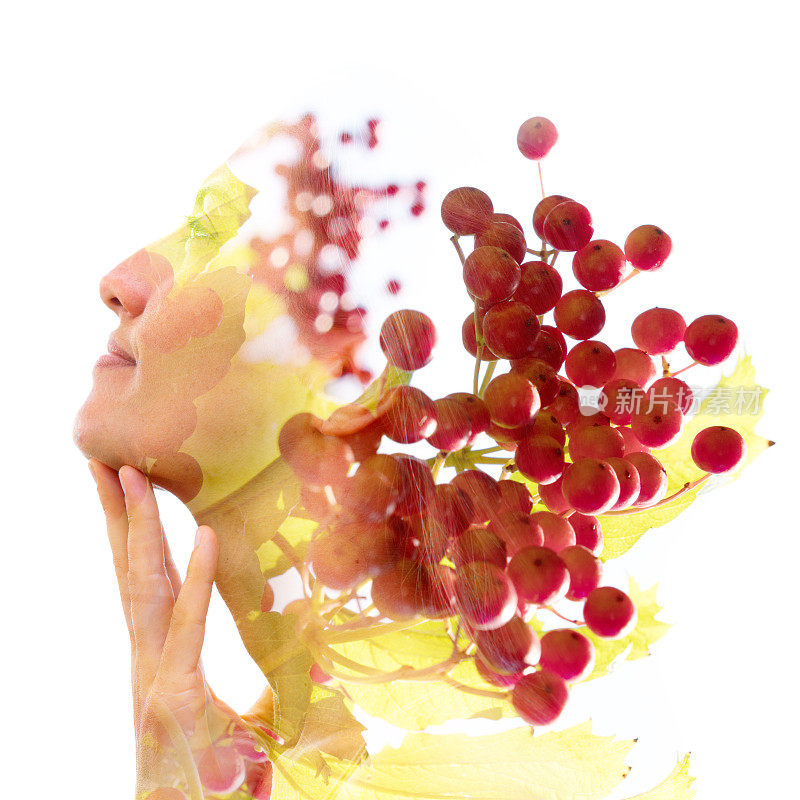 双重曝光的自然美景与成熟的红色水果，似乎从她的头发生长，以白色的背景