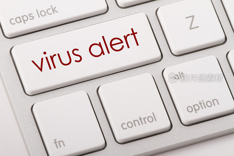 电脑键盘上的病毒警告字。
