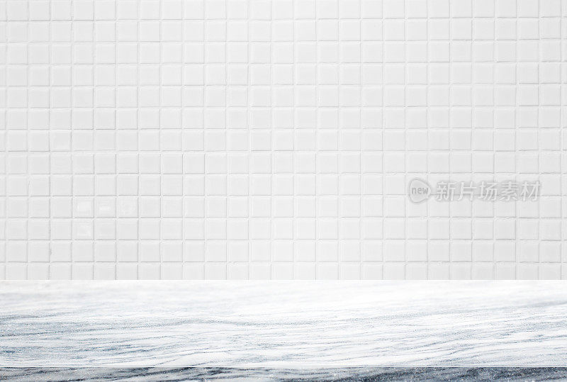 石材台面和白色瓷砖墙的背景