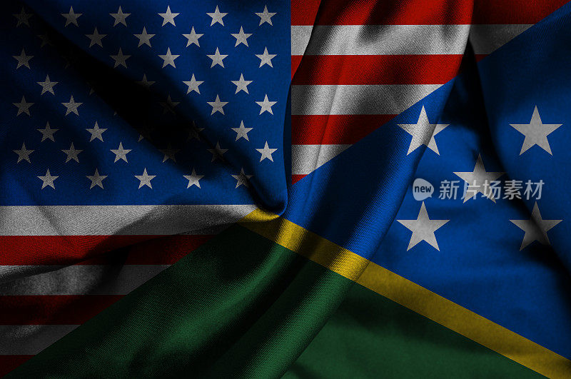 挥舞着所罗门群岛和美国的旗帜