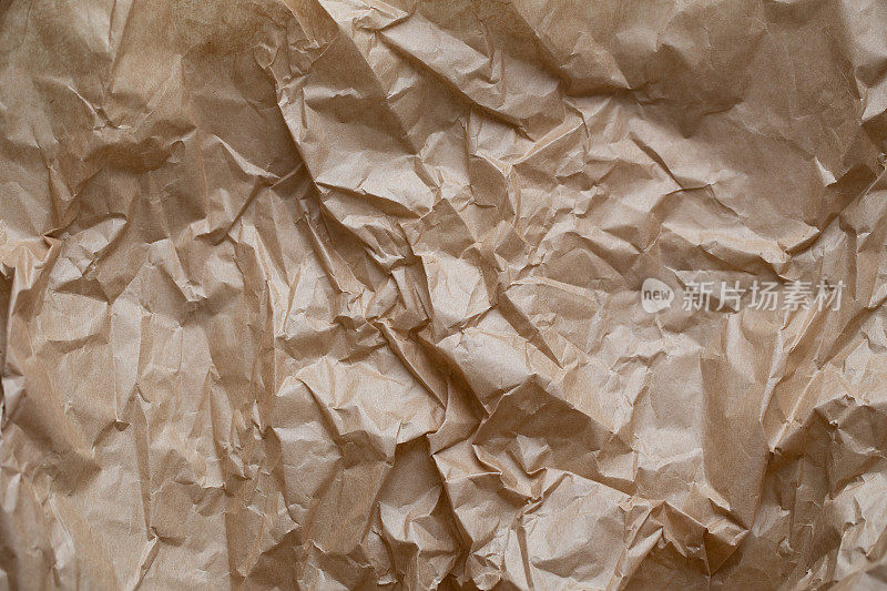 包装上的皱巴巴的牛皮纸作为背景纹理。