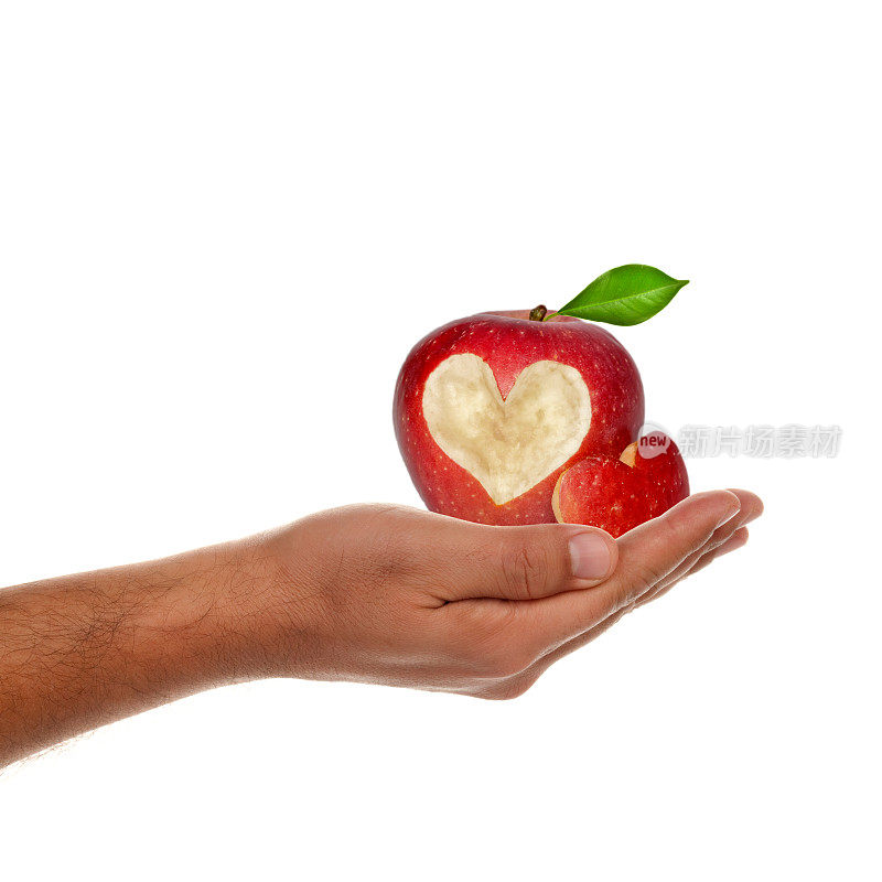 红苹果在人的手上与心隔绝的象征
