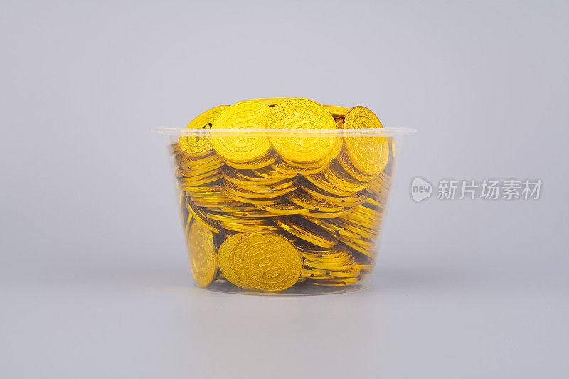 玻璃罐里的金币，高汇率投资和黄金股