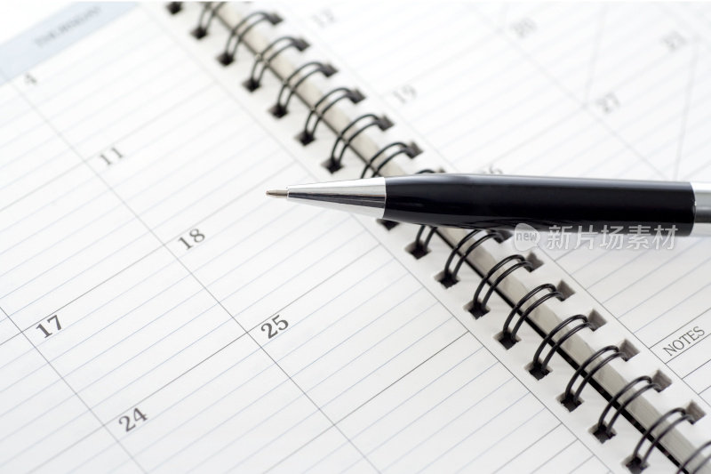 预约簿、日历和钢笔