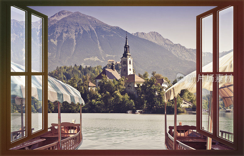 典型的木船，在斯洛文尼亚称为“Pletna”，在流血湖，斯洛文尼亚最著名的湖与岛的教堂(欧洲-斯洛文尼亚)-概念图像